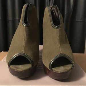 Hunter green peep toe heels.